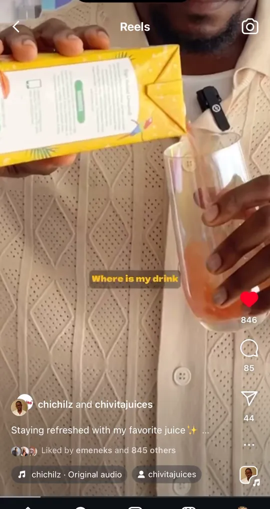 A creator holds up a carton of Chivita in an Instagram reel